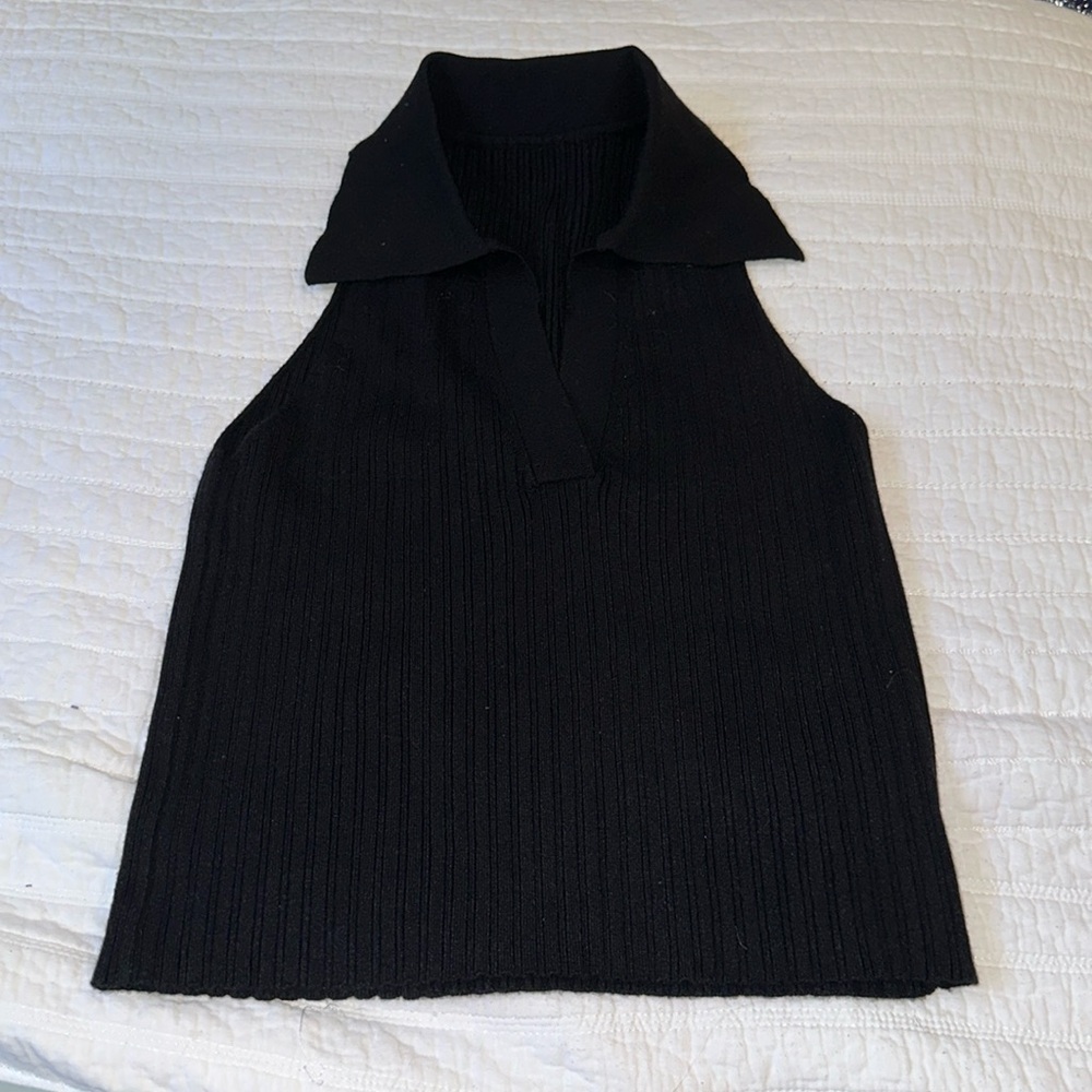 Black collared waist length top